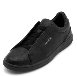 Dettaglio laterale della sneaker senza lacci Margot Laceless Black, design elegante con suola in gomma bassa per un comfort superiore.
