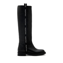 Load image into Gallery viewer, Stivale flat VALENTINO in pelle di vitello nero con nastro logato e suola in cuoio